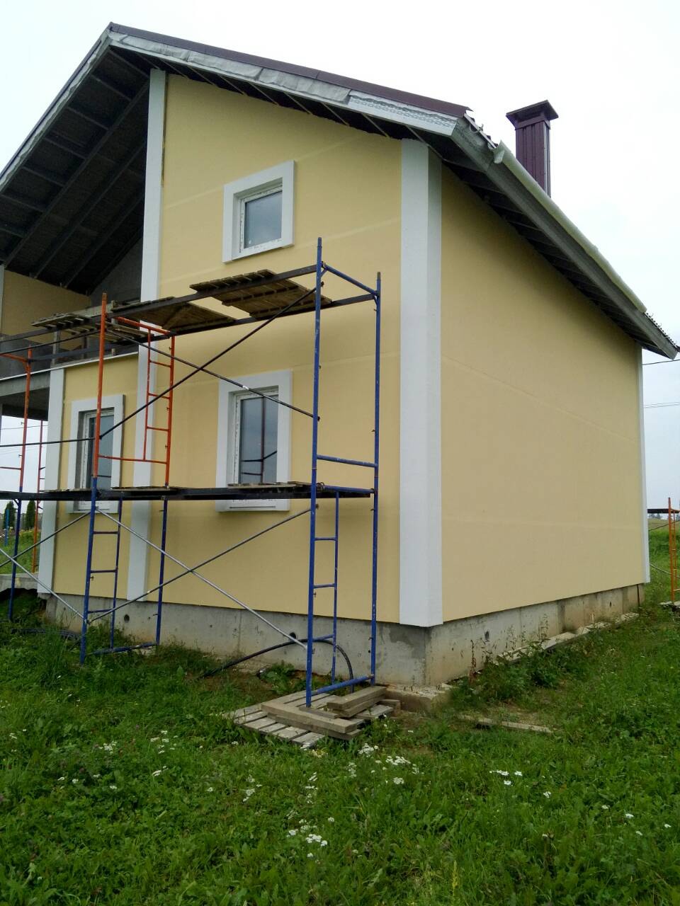 покраска каркасного дома